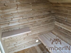 Outdoor hobbit style wooden sauna 33