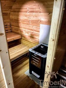 Outdoor hobbit style wooden sauna 9
