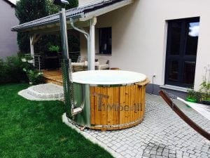 Fiberglass lined hot tub with integrated burner thermo wood Wellness Royal 3 2