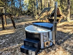 Black fiberglass lined hot tub with integrated burner Wellness Scandinavian 38