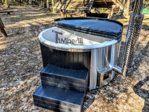Black fiberglass lined hot tub with integrated burner Wellness Scandinavian 41